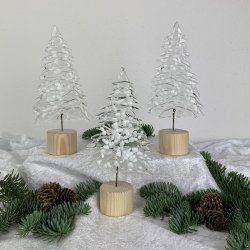 Juletrer med sne p lys fod